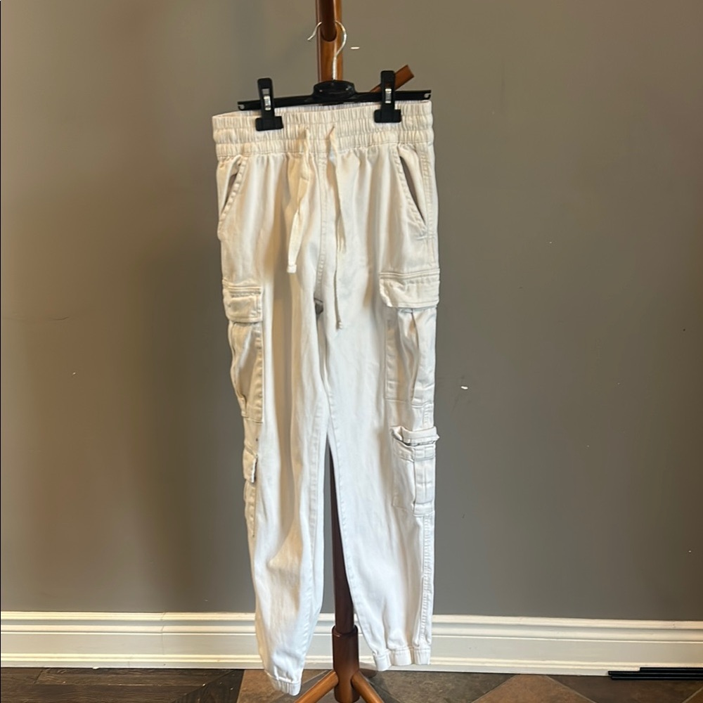 Cream Cargo Jogger Pants - ink spot on the knee